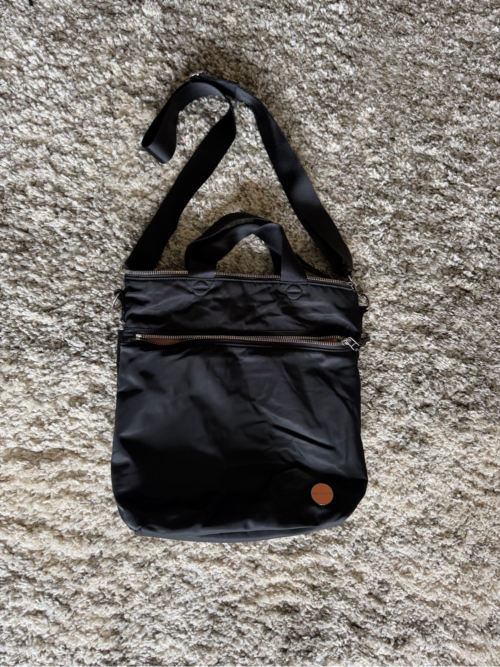 Black Nylon Messenger Bag with Top Handles and Adjustable Strap